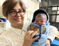 client-img-2 Dr Meenu bahnot with new born babay of her client